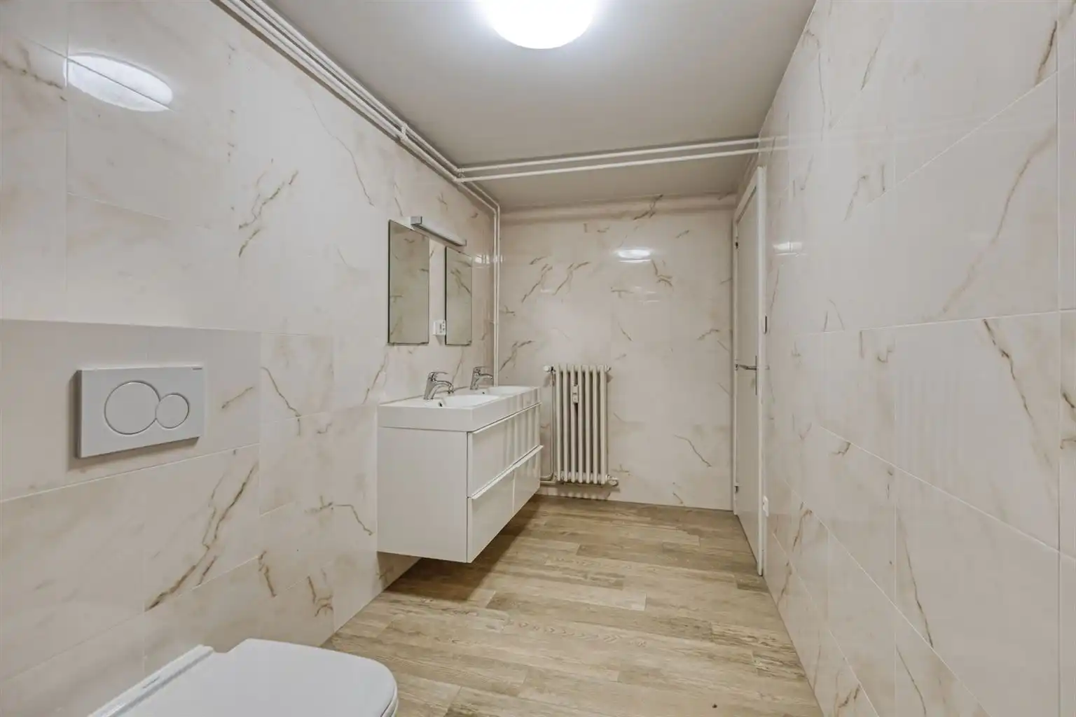 Prachtig ruim appartement met 3 slaapkamers en autostaanplaats gelegen in het hart van Maaseik.  foto 18