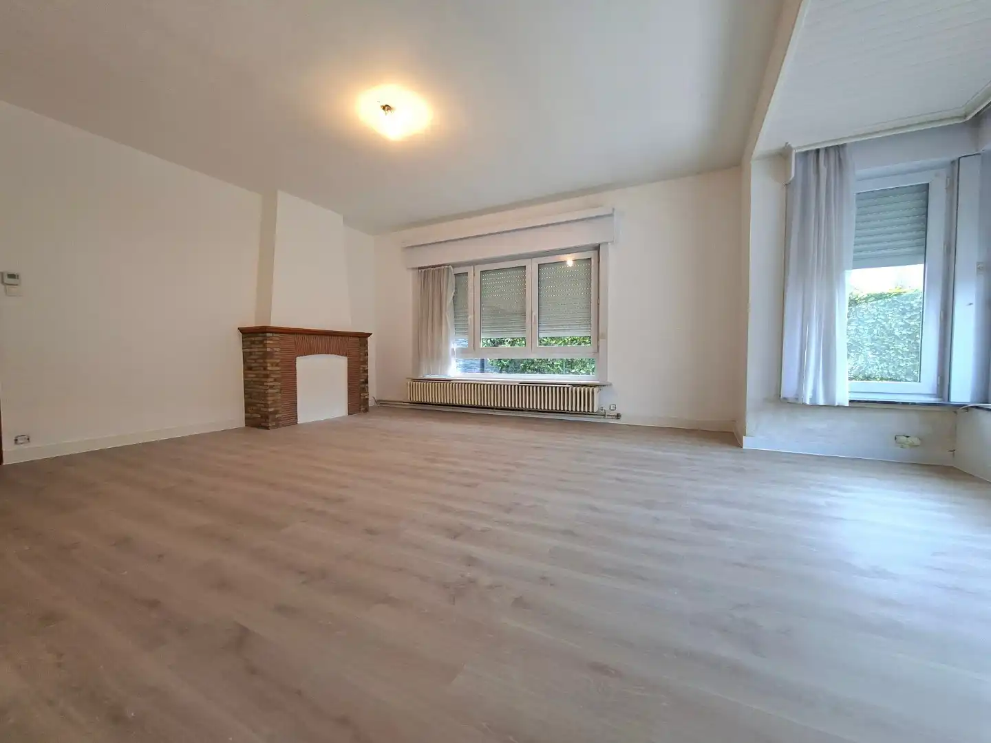 Gelijkvloersappartement met terras en garage foto 15