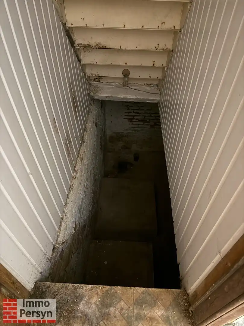 Te renoveren woning met zuidtuin en achteringang met garages foto 18