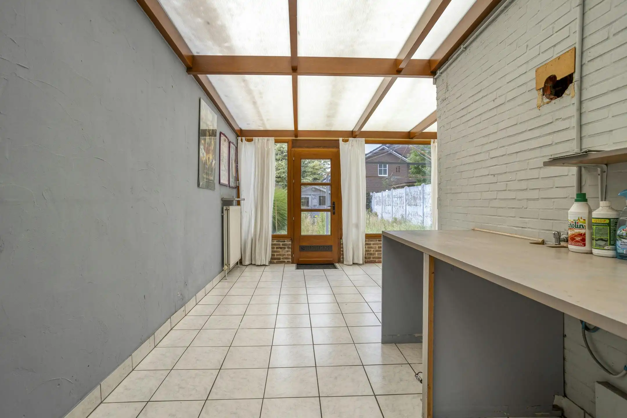 Te renoveren huis met vier slaapkamers en tuin in Kruibeke foto 7