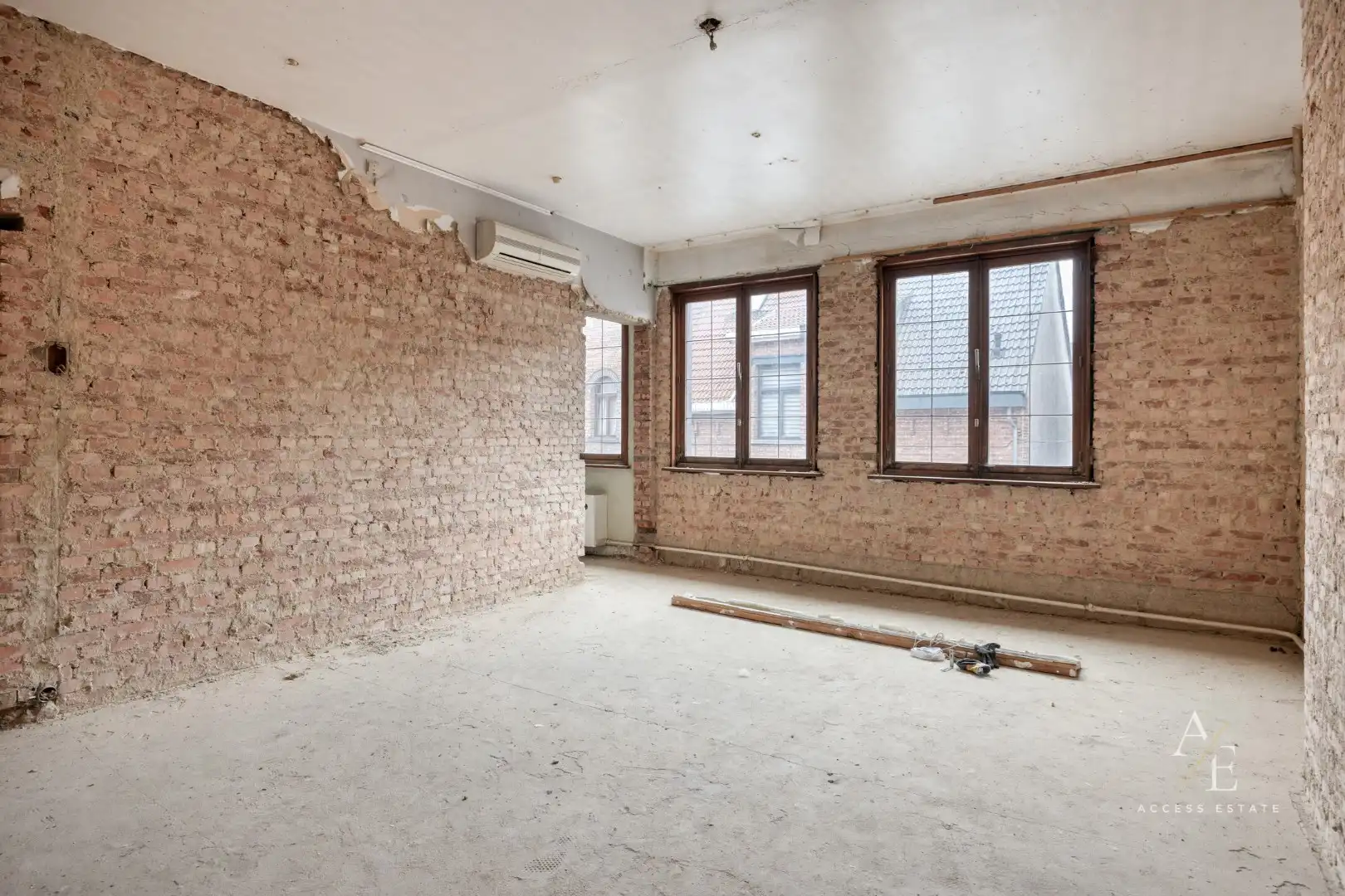 Veelzijdig te renoveren eigendom met tuin en 2 garages en achterdoorgang in Temse foto 10