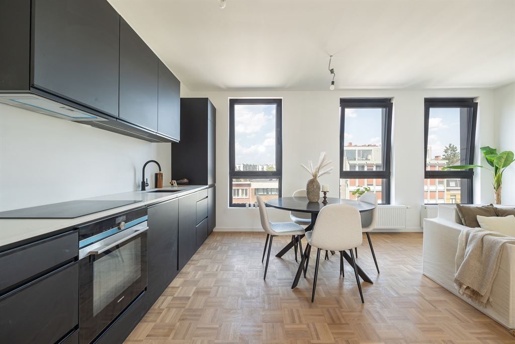 Nieuwbouw penthouse met tof terras foto 2