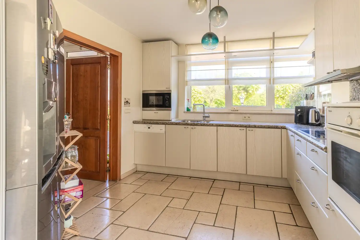 Ruime, instapklare vrijstaande woning met 5 slaapkamers en 3 badkamers in het gezellige Neerharen! foto 15