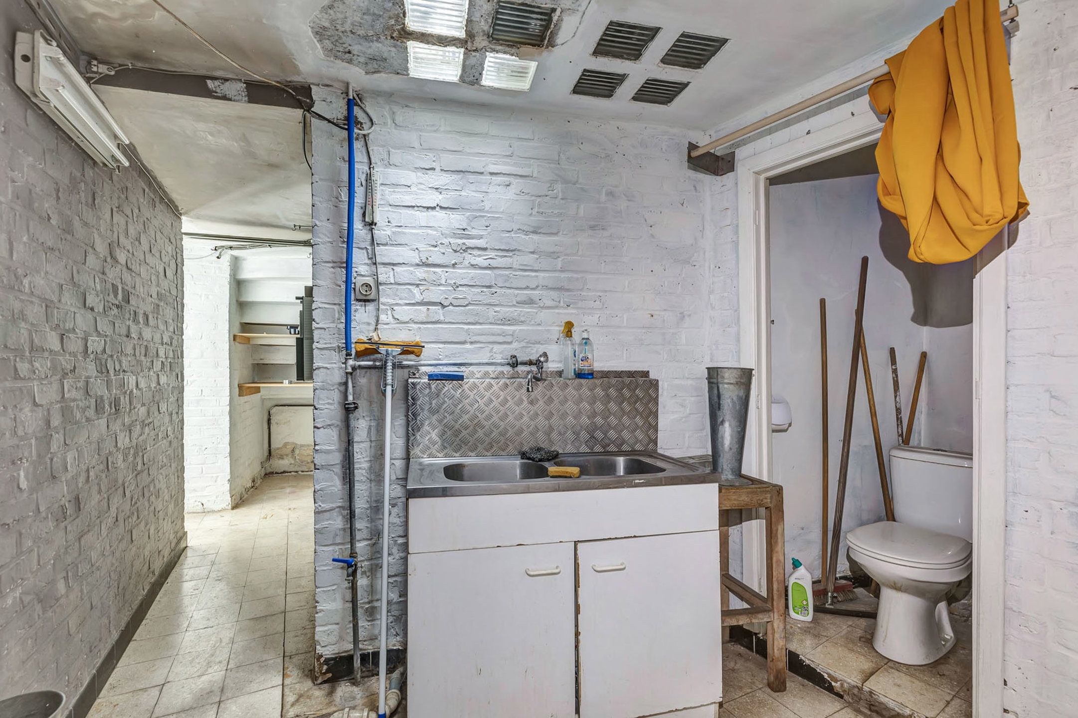 Opbrengsteigendom: Handelsruimte met 3 slpk app in centrum foto 13