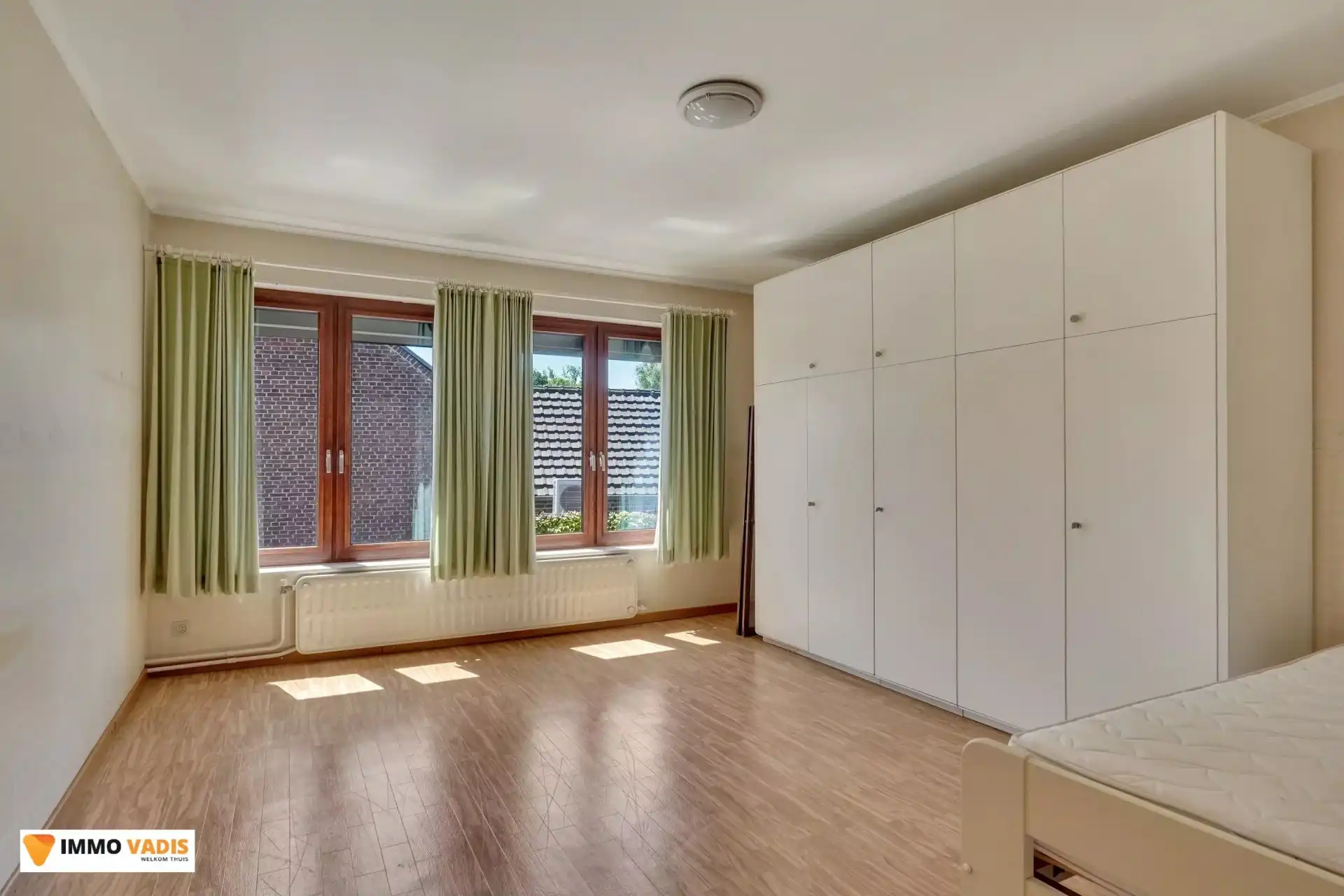 Ruime gezinswoning met 3 slaapkamers, garage en tuin foto 10