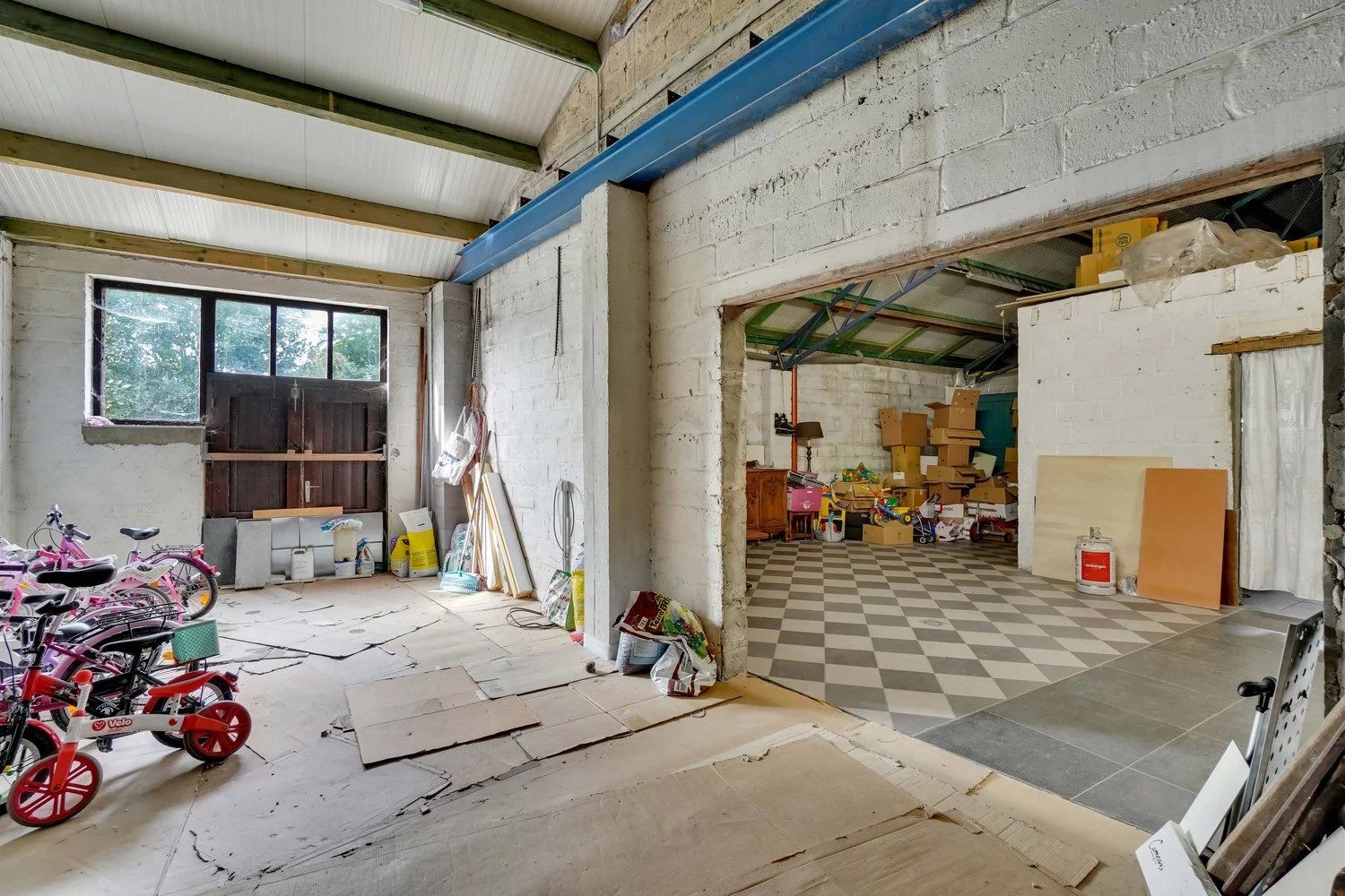 Halfopen bebouwing met 3 slaapkamers en handelspand foto 21