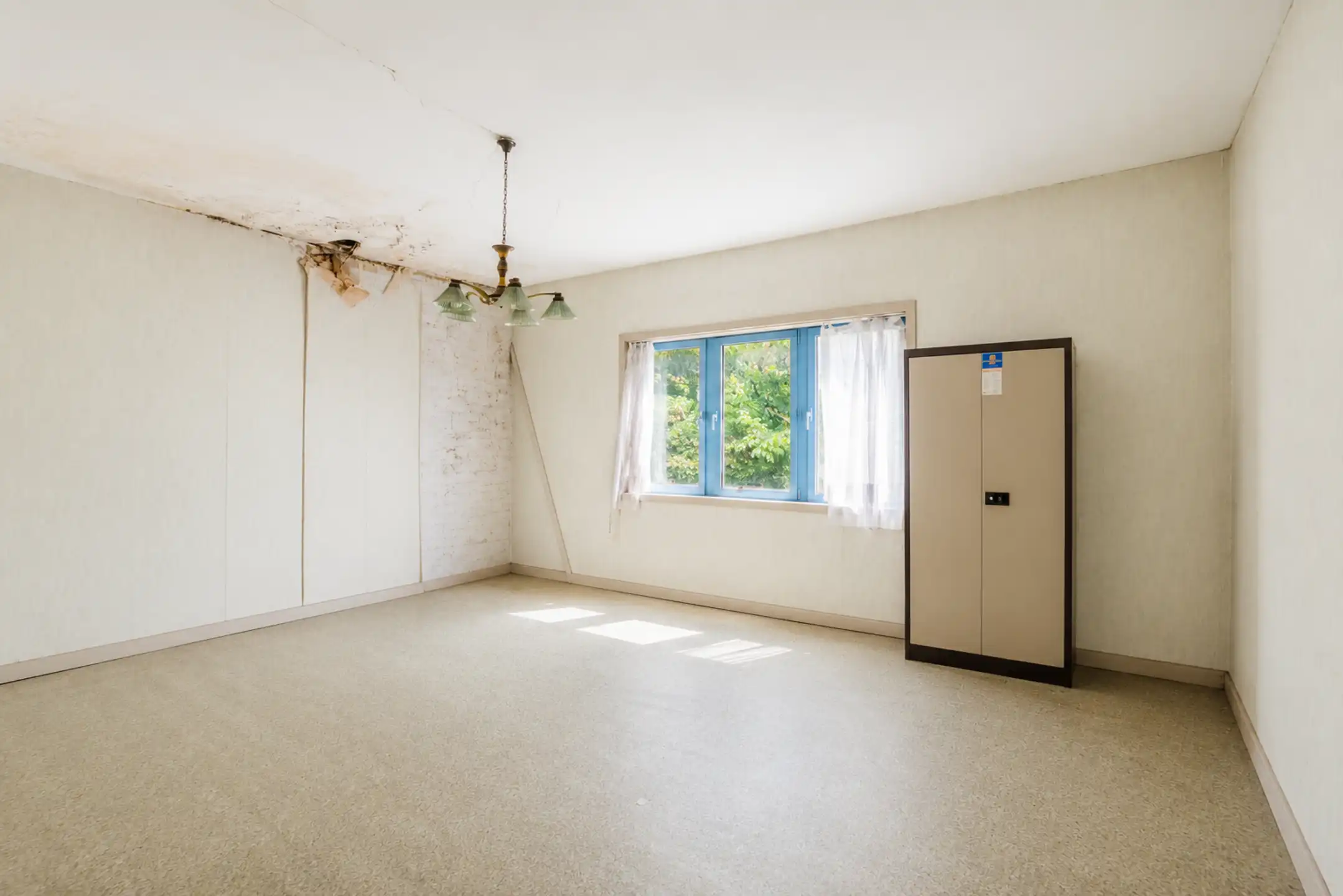 Te renoveren woning met commerciele ruimte in centrum Deinze foto 17