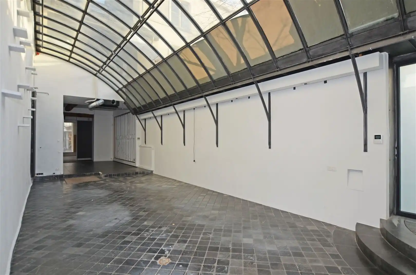 Uniek neoclassicistisch herenhuis met handelspand & duplexwoning foto 5