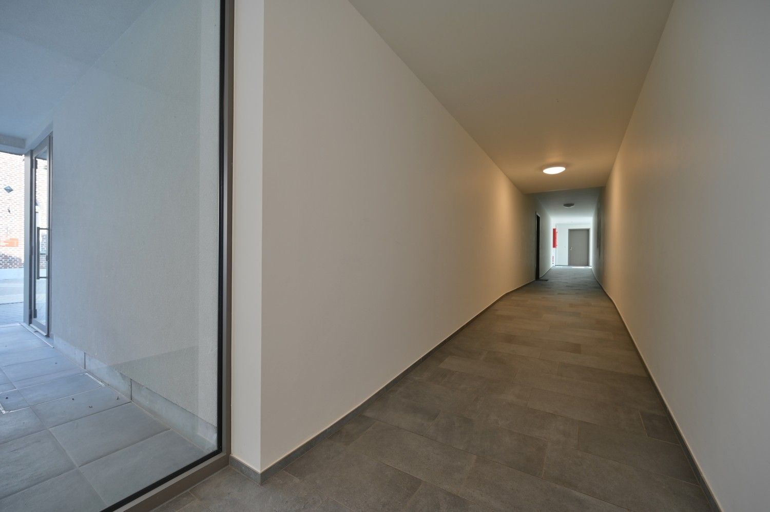 Gelijkvloers appartement met 2 slaapkamers en privétuin in het centrum van Lanaken. foto 22