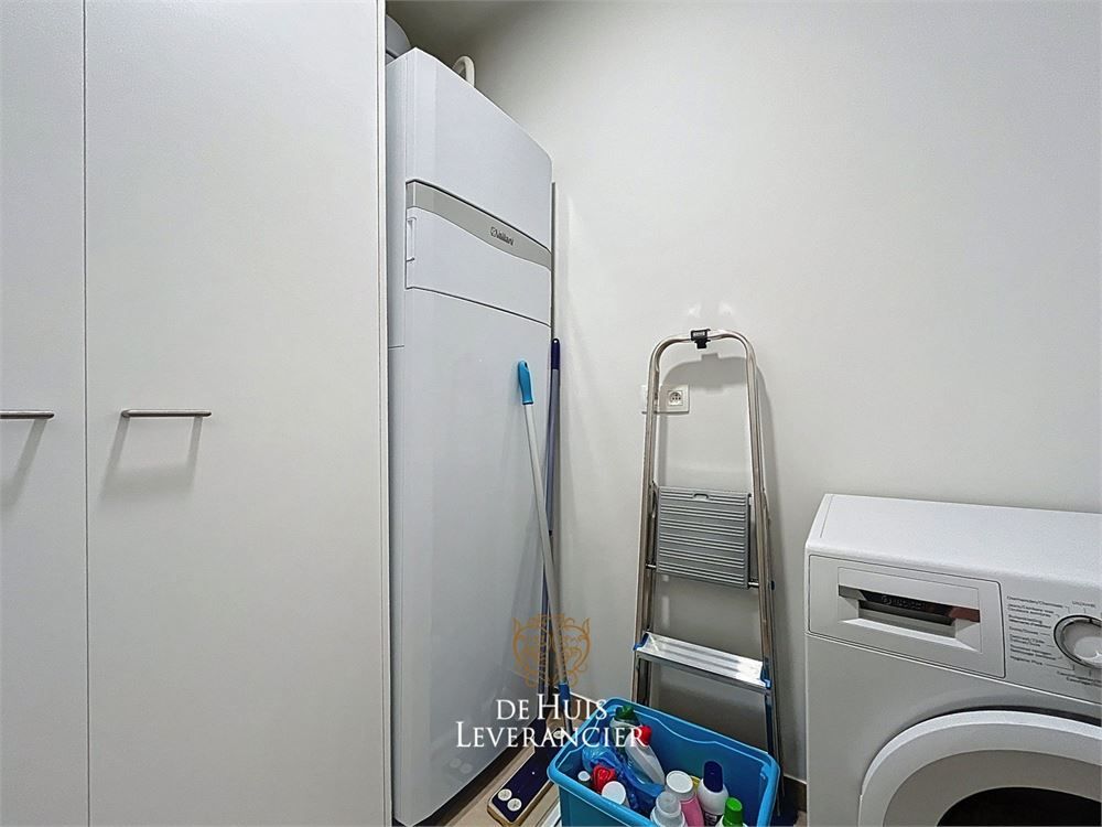 Discrete luxe & tijdloze elegantie : subliem nieuwbouwappartement met terras en gemeenschappelijk tuin te koop in Boechout foto 28