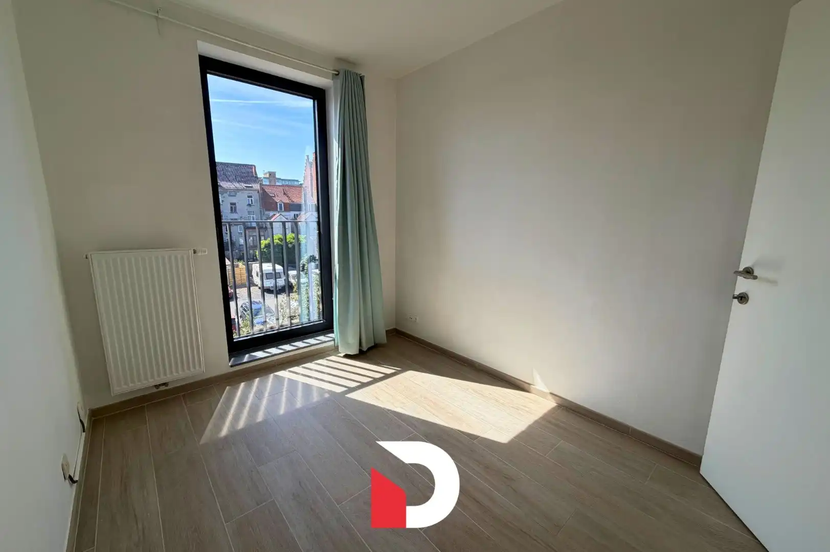Appartement met 2 slaapkamers, ruim terras en autostaanplaats foto 9