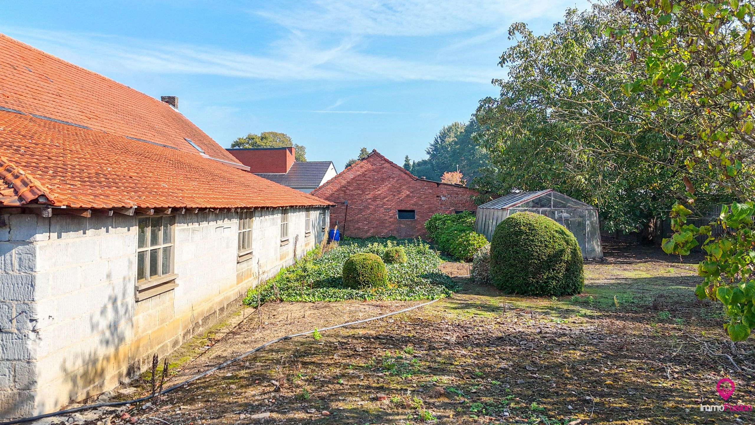 Ruime boerderij op ±33a met stallen en renovatiepotentieel! foto 27