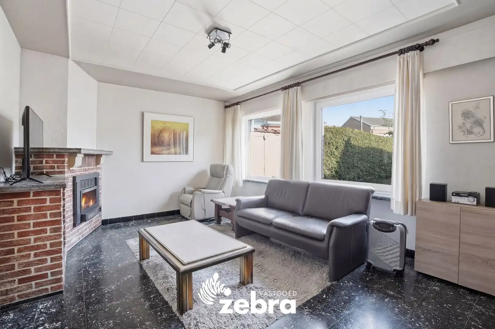 Te renoveren woning met veel potentieel op rustige ligging! foto 4