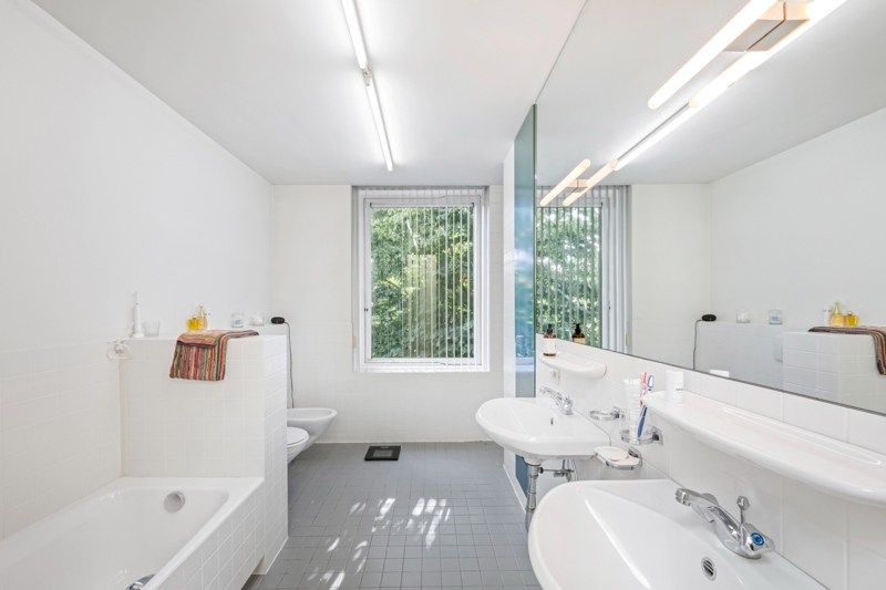 Instapklare architecturale woning met prachtige tuin en uitstekende ligging foto 22