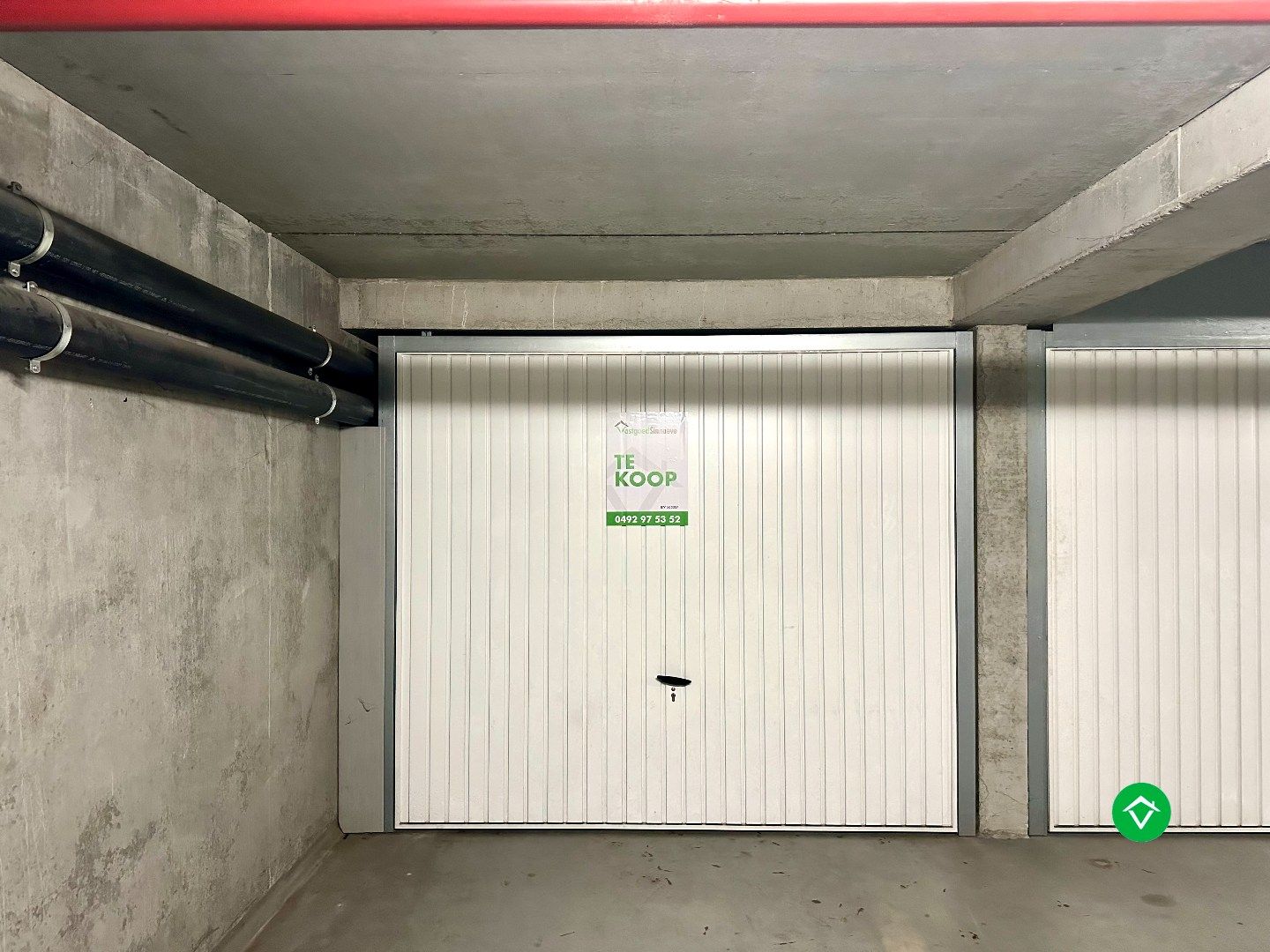 Ondergrondse garage (18,75m²) in centrum Gistel te koop  foto {{pictureIndex}}
