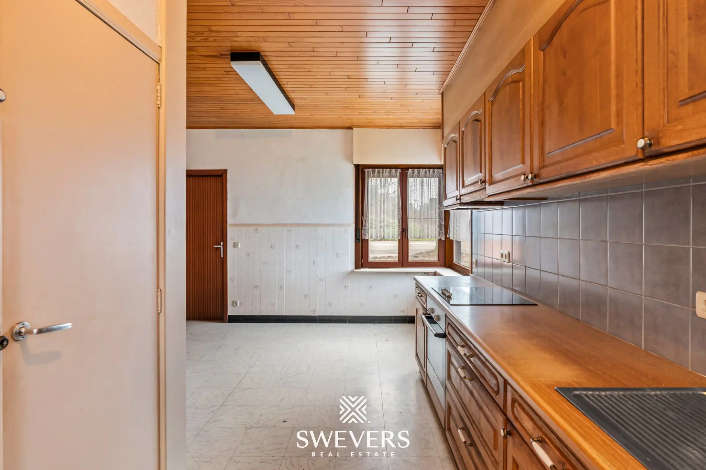 Te renoveren halfopen woning met ruim perceel in Diest foto 8