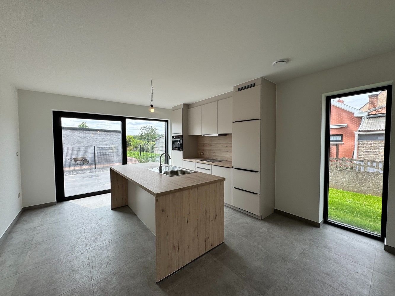 Te huur in Zutendaal - Energiezuinige nieuwbouwwoning met drie slaapkamers foto 2