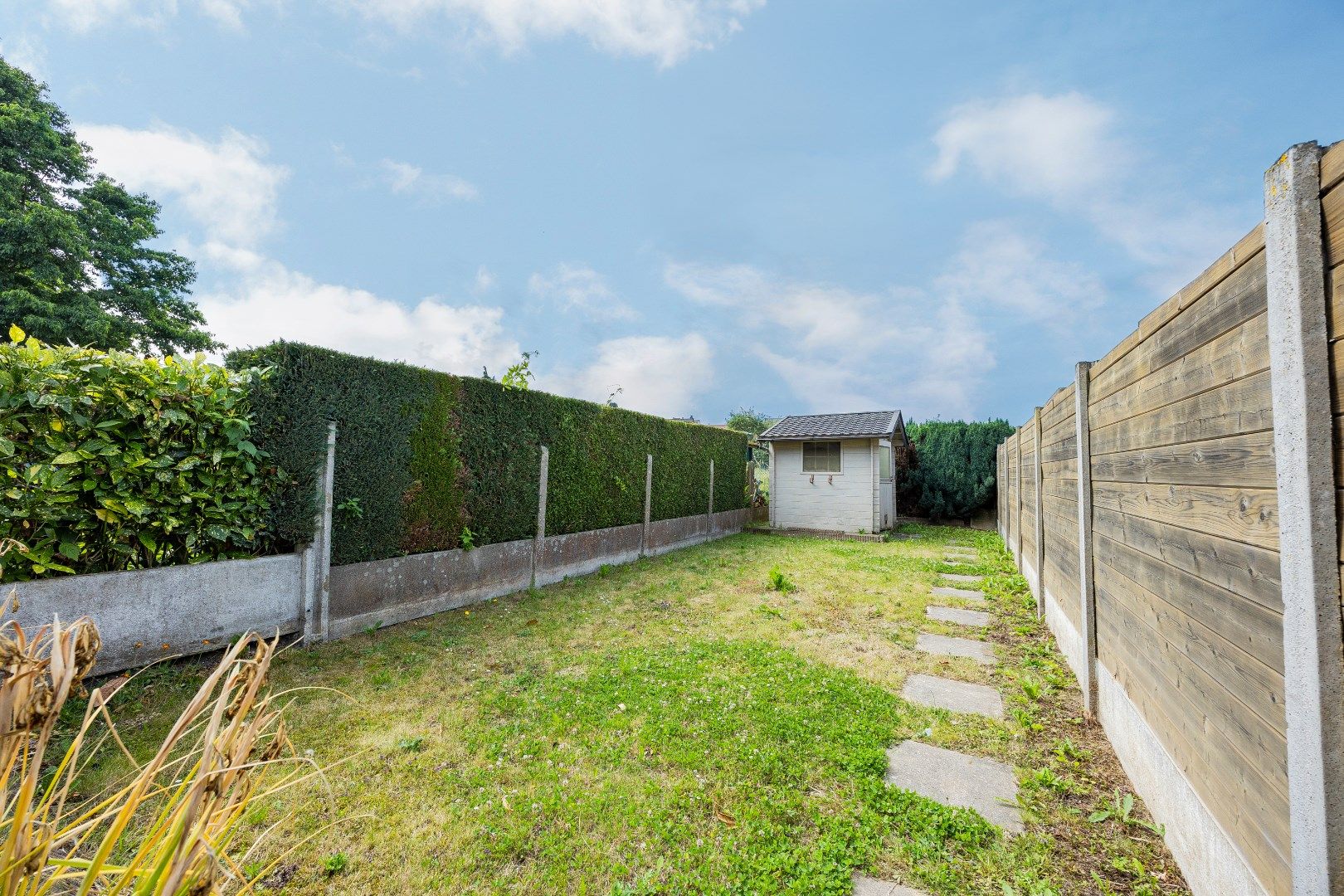 Te renoveren woning met 4 slpks en tuin te Huizingen foto 13