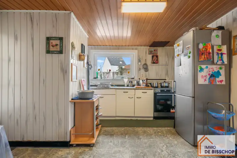 Te renoveren half open bebouwing met 3 slaapkamers, tuin en garage. foto 7