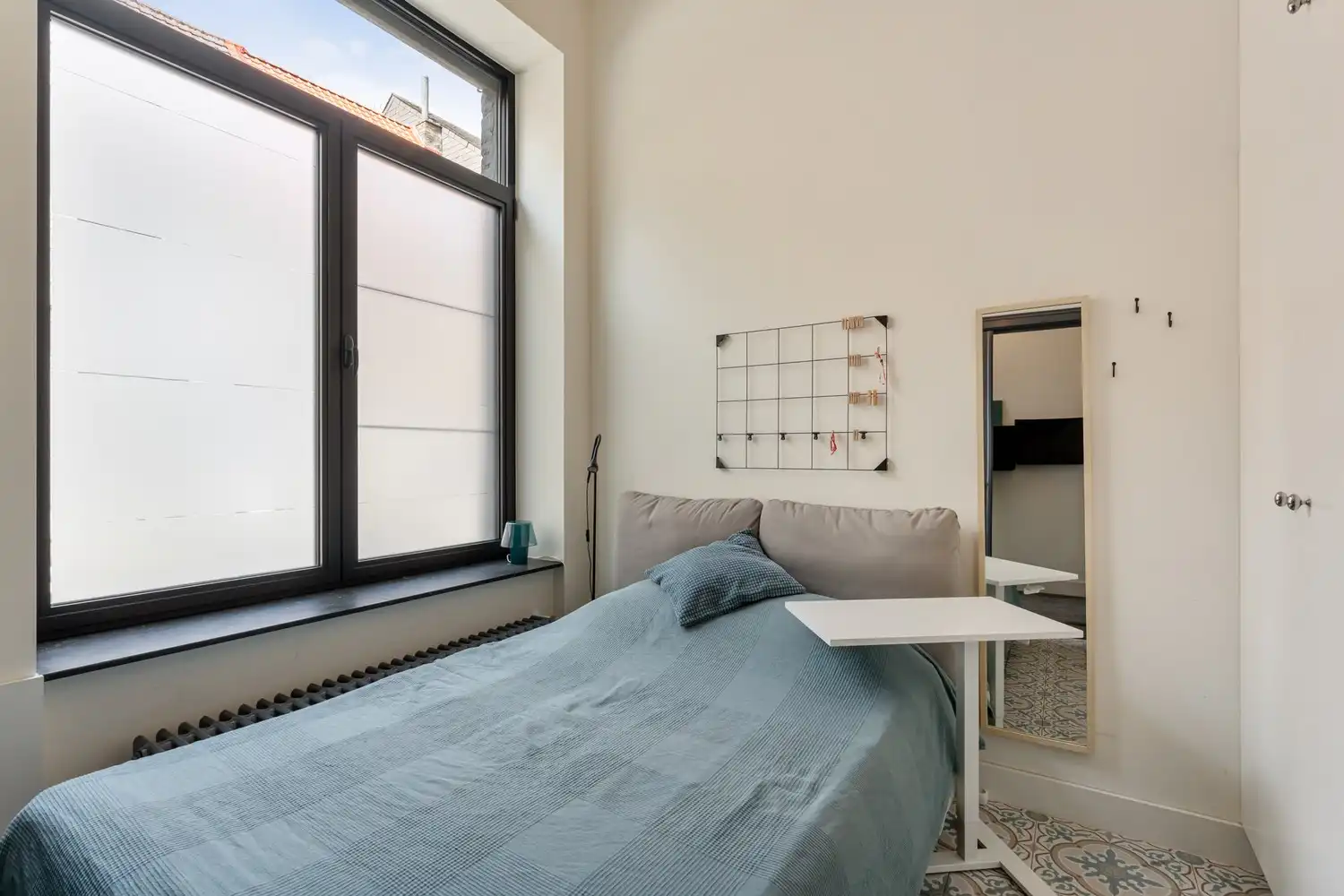 Gerenoveerde en energiezuinige woning met 4 slaapkamers en een tuin met een achteruitgang en een grote garage te centrum Leuven! foto 18