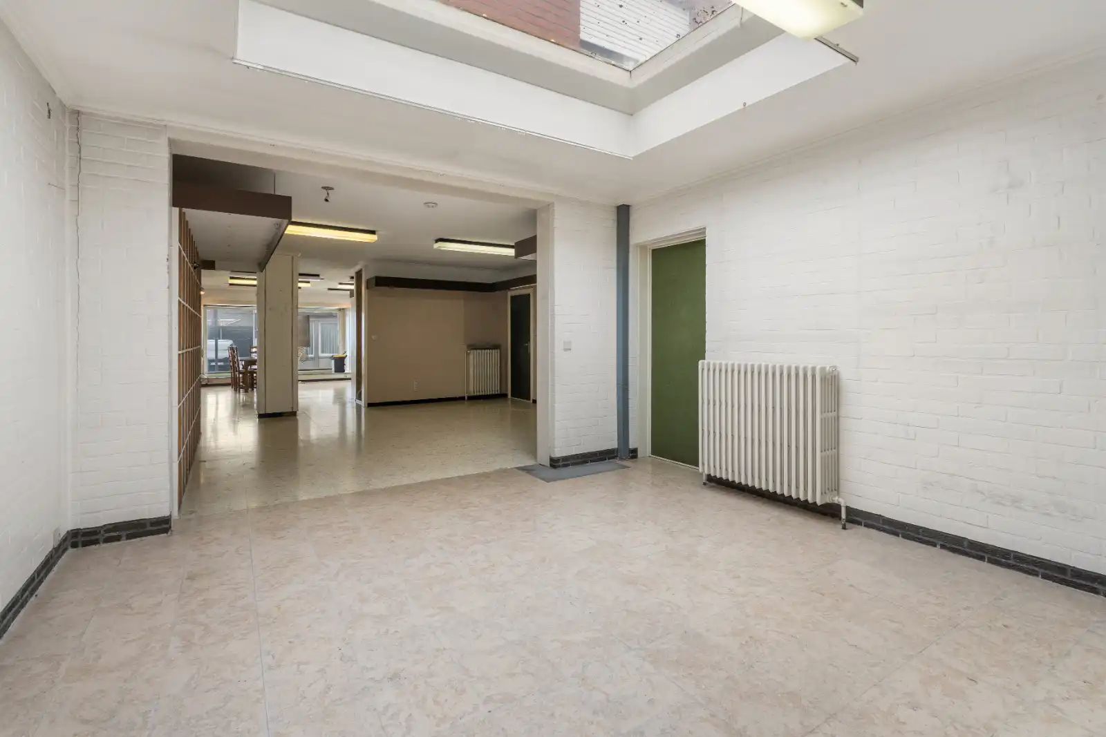 Handelswoning met opslagruimte (112,60m2) in centrum Ardooie! foto 8