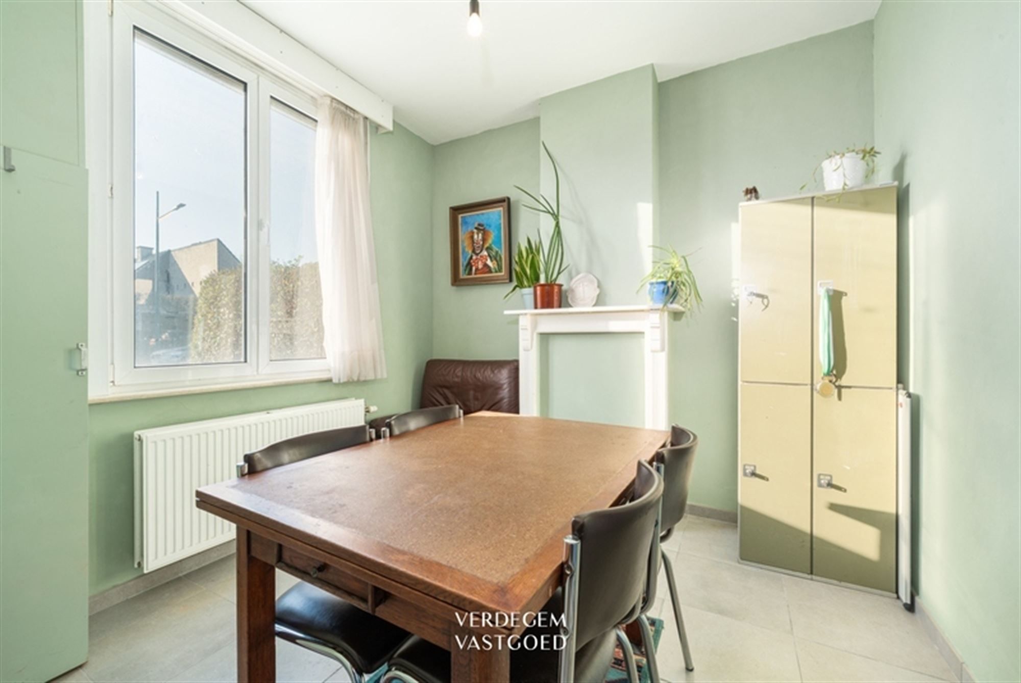 Centraal gelegen woning met 2 slaapkamers, garage en tuin foto 5