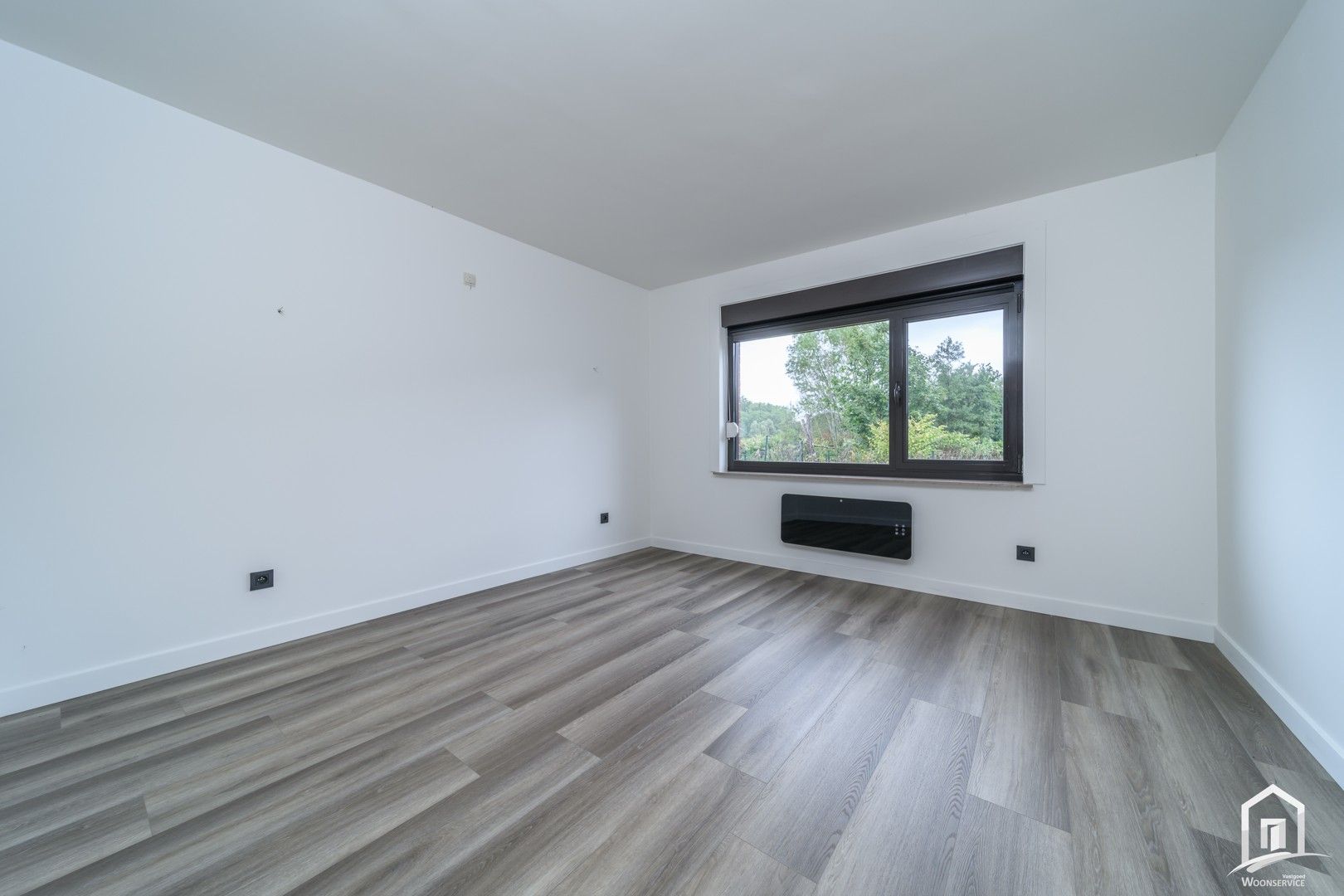 Totaal gerenoveerd gelijkvloers-appartement met tuintje foto 18