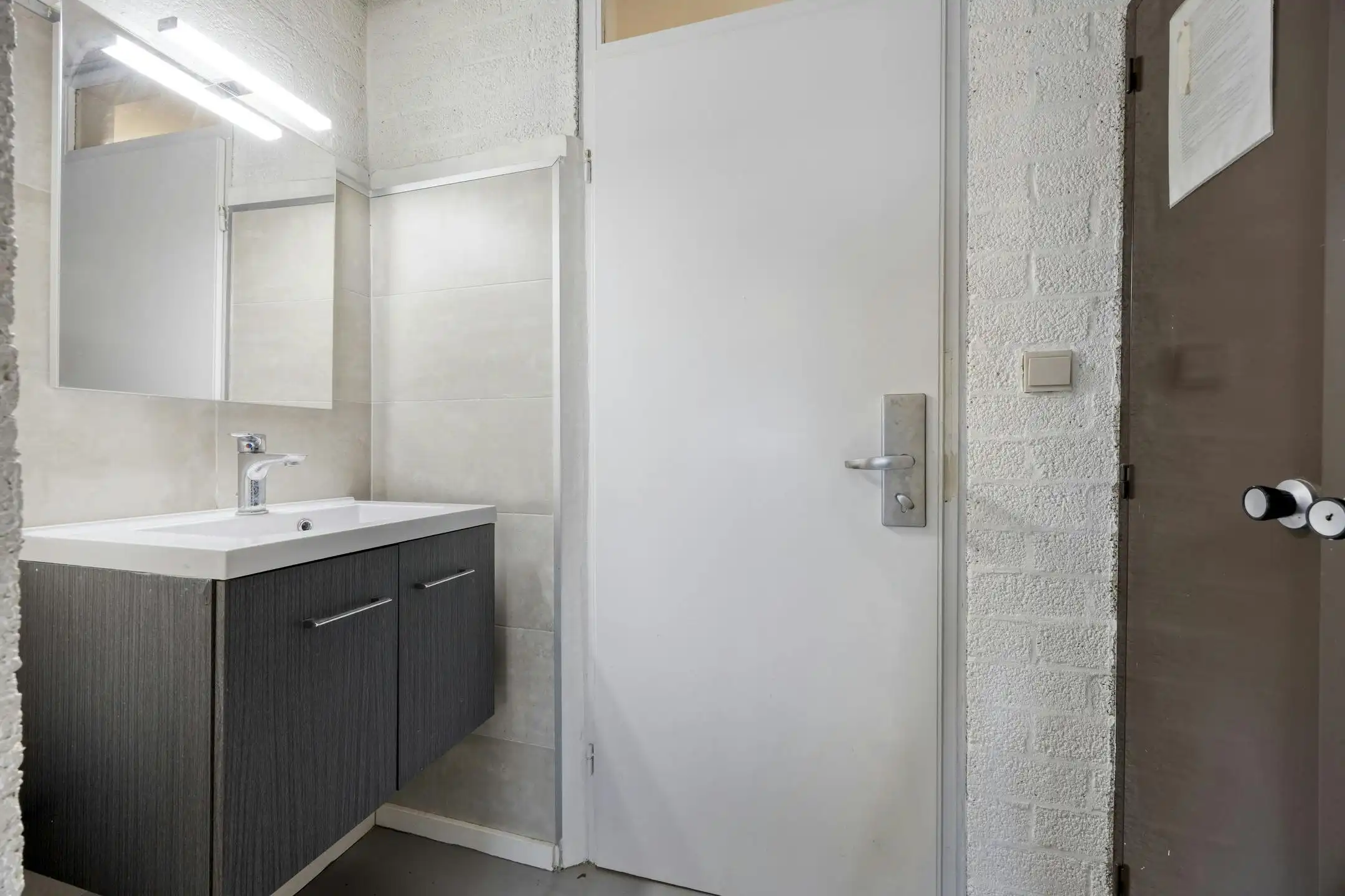 Opbrengsteigendom met 9 studentenkamers en duplex-appartement te Hasselt foto 9