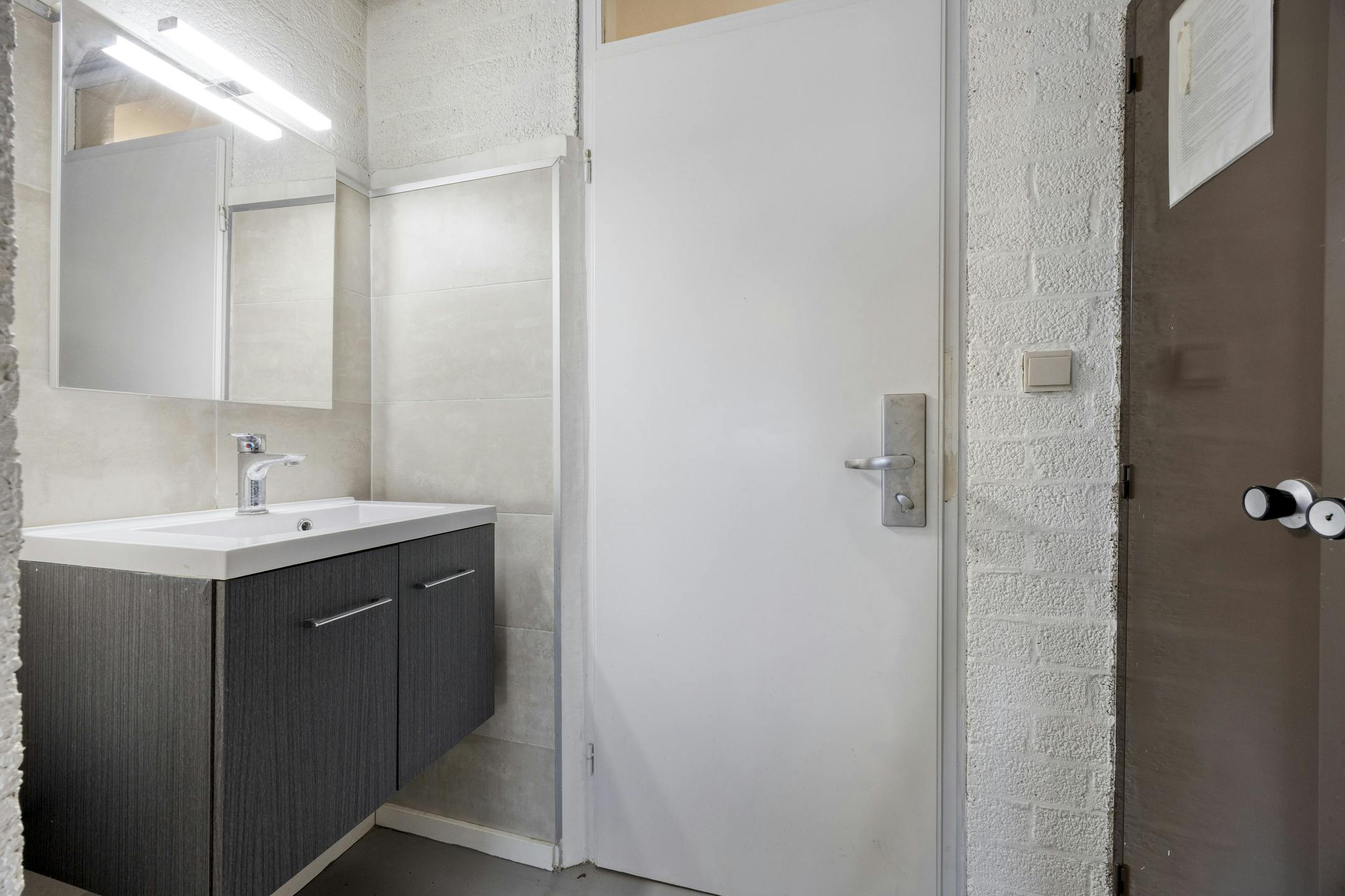 Opbrengsteigendom met 9 studentenkamers en duplex-appartement te Hasselt foto 9