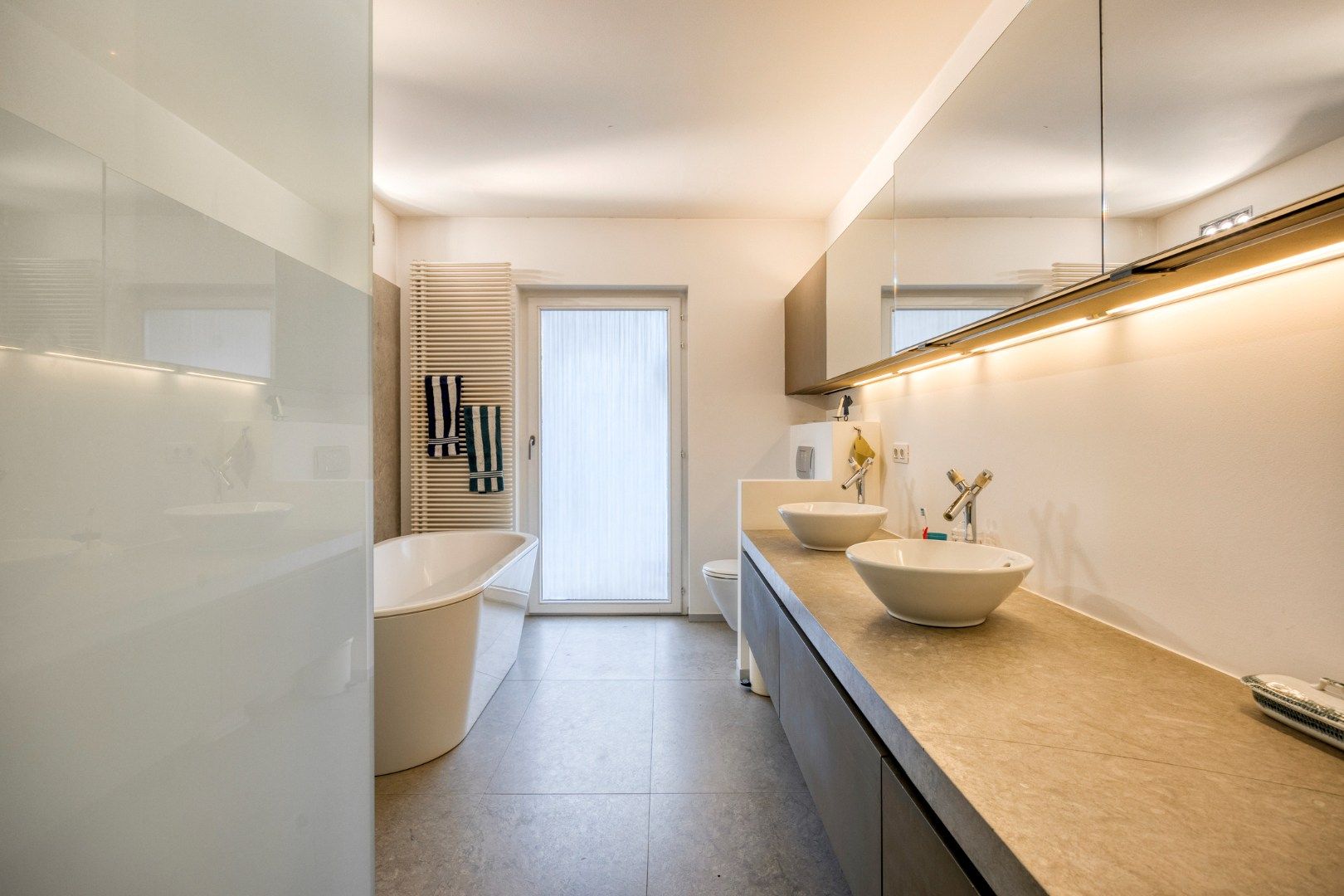 Gelijkvloers appartement met een terras van 50m²,  3 slaapkamers en 2 staanplaatsen in het centrum van Leuven! - bewoonbare opp. 147m²  foto 18