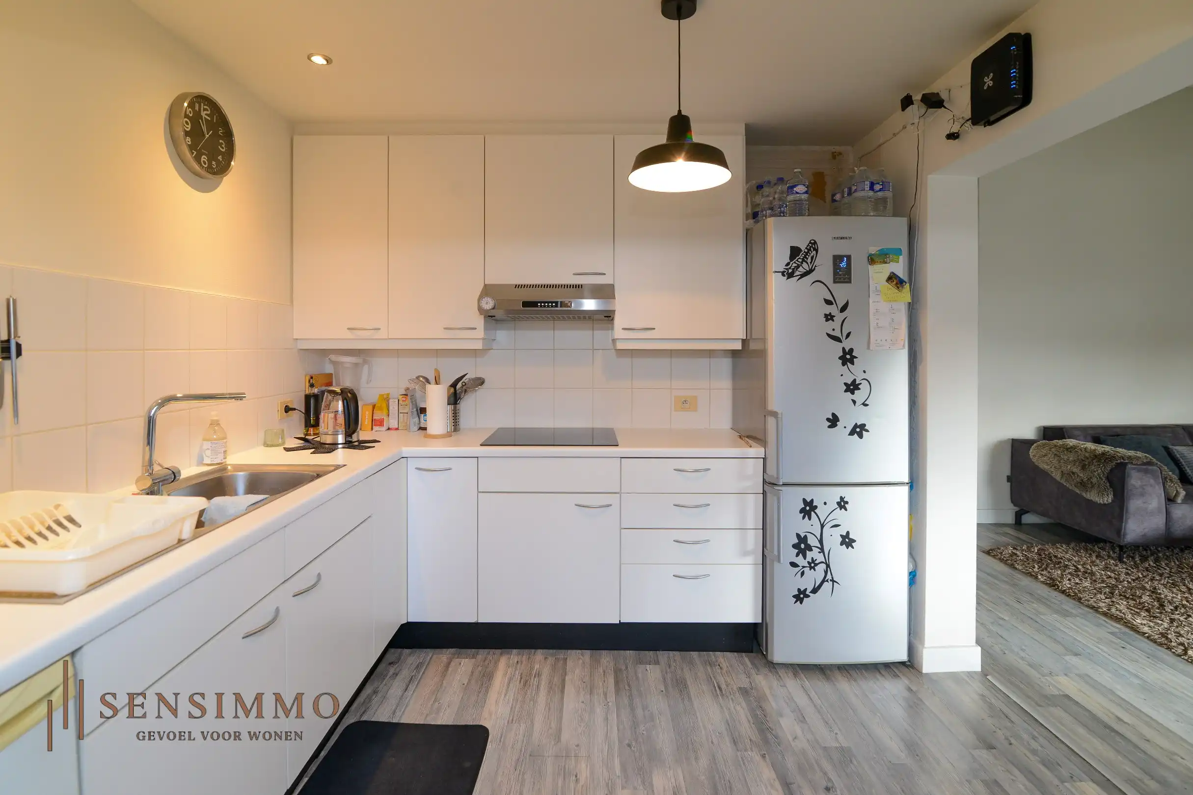 Commerciële handelspand met bovenliggend appartement in hartje Maasmechelen foto 5