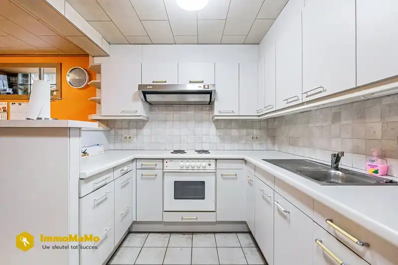 Ruime handelswoonst te koop in de dorpskern van Destelbergen foto 8